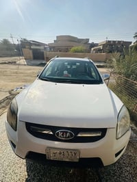 سبورتج 2010 • محرك 2000 • فتحة سقف