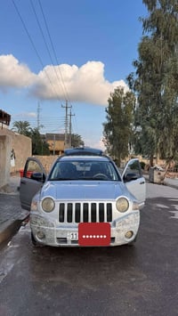 جيب كومباس 2008 لون سلفر رقم بغداد  مكفولة كفالة عامة ماعده التبريد هو...