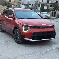 كيا نيرو 2023 ماشيه 56 الف كيلو كهرباء بالكامل فول عدا الفتحه رقم بغدا...
