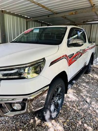 تويتا هايلوكس 2025 فور ويلSAS ضمان الشركه اخت الزيرو ماشيه13فقط رقم بغ...