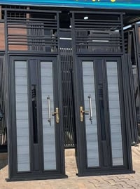 حدادة الديوانية • أبواب وشبابيك • مضلات كراجات