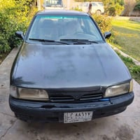 نيسان براميرا (للبيع) موديل 1992 گير ومحرك مكفلوت والسياره بأسمي الرقم...