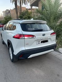 للبيع كورلا كروز 2024 ساس لون ابيض رقم بغداد الجديد هزه جديده بسمي شرط...