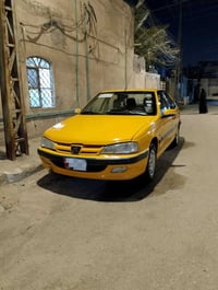 بيجو بارس • سيارة بيجو • بيجو برتقالي • سيارة للبيع • رقم بغداد