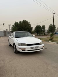 كامري موديل 1991 كير ومكينه مكفولات  تبريد ثلج رقم بغداد الدولي مصفره ...