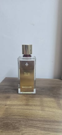 عطر تيليا اورجنال مستخدم كما موضح بالصورة للبيع فقط واتساب 07503434364