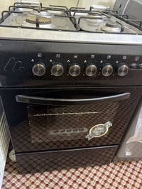 طباخ نيوال ٤ عيون • غسالة مايديا ١٣ كيلو • استعمال شهرين