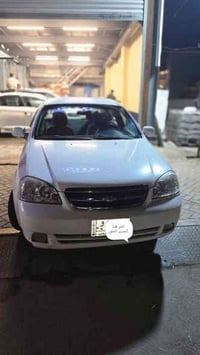 اوبترا موديل ٢٠١٢ مكفوله من الصبغ ماشيه ١٠٠ الف كيلو رقم بغداد السعر ٩...