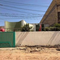 الديوانية الضباط • ٣٠٠م • واجه ١٢ ونص