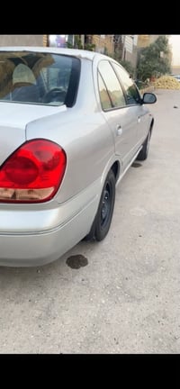نيسان صني2009 ياباني اصلي محرك اسود 1800 المرغوب رقم بغداد دولي  (كفال...