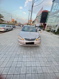 كامري ٢٠٠٤ • محرك مبدل • رقم بغداد