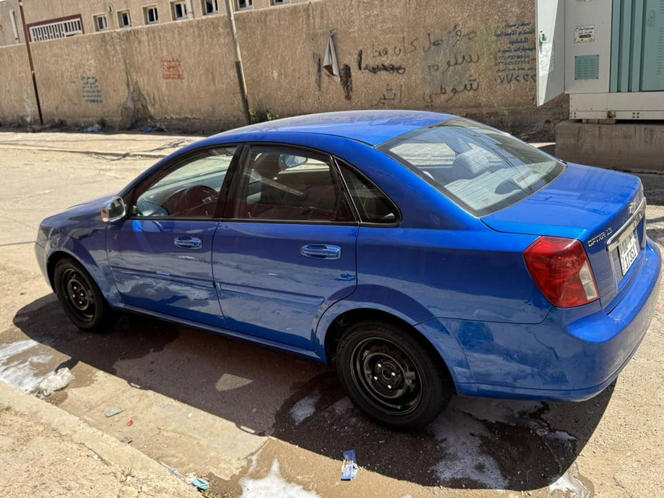 السلام عليكم اوبترة موديل 2010 رقم بغداد الجديد بسمي سيارة بيهة صبغ خشم الجاملغ والبنيد فقط لا ضربة ولا جراد بعدهي على وضع الشركة السيارة كلش  جديدة اب معنة الكلمة وجاهزة من كلشي مكينة كير تبريد تخم تاير كلهة كفالة دوشمة الرضية شرط بيهة سبير الشركة السيارة كير عادي اكرر كير عادي تلفون *********** السعر 70$ العنوان بغداد الشعب
