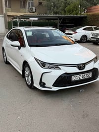 كورلا 2025 ماشية 7000 كم داخل احمر كرسي كهرباء فول مواصفات  السعر 163$...