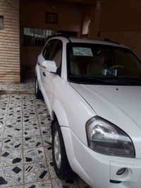 توسان ٢٠٠٩ / لون أبيض/  رقم بغداد(مشروع وطني) / خليجي / محرك ٢٠٠٠ / ما...