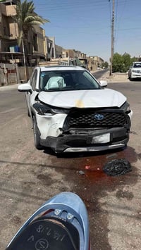 كورلا كروس 2024  رقم بغداد ماشية 50 الف حادثها موضح بالصورة طاك بيها ج...