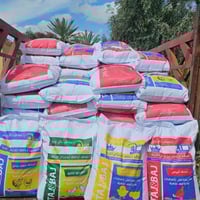 مكونات اعلاف تاج وباج حنطة ذرة صفراء فول صويا خمائر فيتامين C فيتامينا...