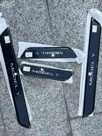 سستم دوس • تيسلا مودل Y • بغداد