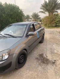 كيا ريو  موديل ٢٠٠٧  صبغ حزام فقط وبدون دواخل  گير اوتو محرك شرط  تبري...