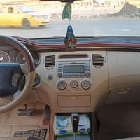 ازيرا مديل ٢٠١٠ تكسي فول مواصفات خليجي بيهه حادث امامي خفيف واصل للبدن...