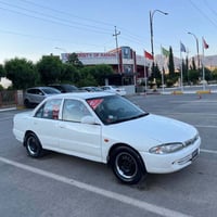 بروتون • اوتوماتيك • ٢٠٠٤
