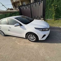 سيراتو ٢٠٣٣كفاله عامه ماشيه 11 الف محرك ٢٠٠٠رقم بغداد موصفات عاديه ٠٧٧...
