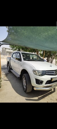 ميسبوشي L200 • ٢٠١٢ • فرو ويل