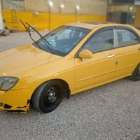 كيه سبكترا موديل 2009وارد امريكي بيهه جاملغ وصبغات بصيطه بسمي رقم مثنى...