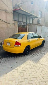 سلام عاليكم كيه سبكترا 2009 وارد امريكي  موصفات معروفه  فتحت سقف مثبت ...