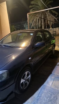 استرا  موديل 2002  مناقصها اي شي  مكينه او كير مكفولات  السياره ابسمي ...