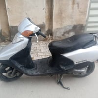 سبيسي • ياباني • سكوتر