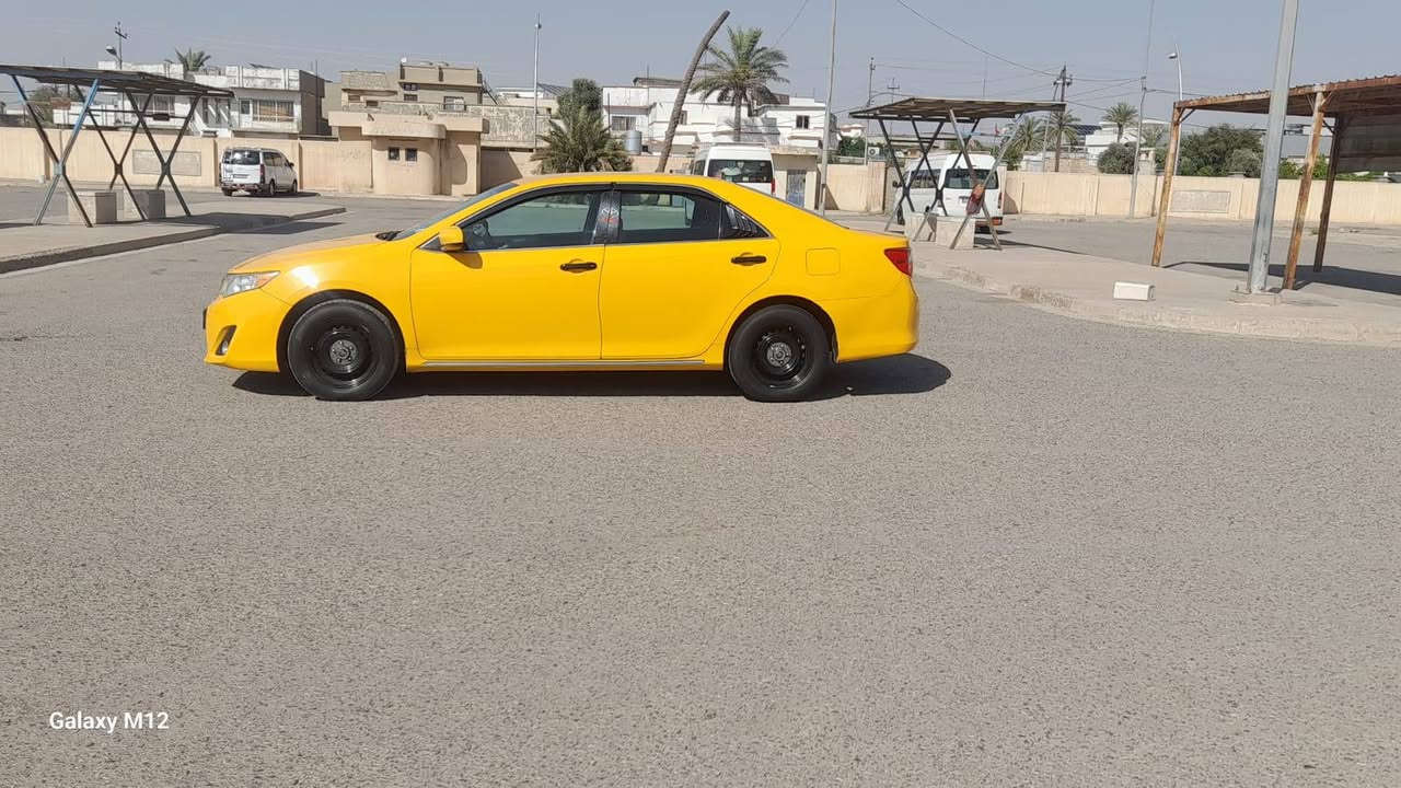كامري ٢٠١٣ ماشيه ٢٠٠ الف ضررها جاملغ أمامي مصبوغه عام اصفر تكسي رقم بغداد للإستفسار الاتصال على الرقم  ***********
