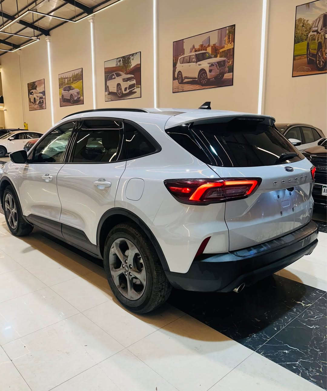 فۆرد ئیسکیب 4پستن 2025 ڕەنگ سمنتی نوێ مواصفات ST Line Select  بەسمە شەغاڵ برێک بەسمە ڕادار 360پلە کوشین کارەبا و هیتەر سوکان هیتەر تەبرید لەمس گێر ماوس شاشە گەورە گێچ دیجیتاڵ الیکترۆنی دبڵ اکسل 4x4 سندوق شفت ویل کرۆم یەدە بەسمە لایت لید زینون تەبرید مەرکەزی ئوتو هۆلد سوکان ڤۆلیوم سیارەکە 10هەزار رۆیشتیە (چاملغ سکن +دەرگا سبغ )پشت و پێش کەپس دعامی لۆ دعامی بەشە رت بێ ناوگرتن لایت بیلادی دعامی بیلادی سیارەکە تازە داخیل بوە کاتی نەشکایە گێر مکینە بەردی گزۆز ڕادارات هەموو بەشەرت سعری 155 کمیک مەجالی تێدایە٠                                                            رقم شانصی  1FMCU9NA3SUA58070
رقم تلفون ***********
*********** أربيل, العراق
