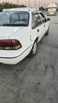 سيارة برنس فراشة للبيع ... موديل 1996 لون ابيض مصبوغة حزام  السيارة كي...