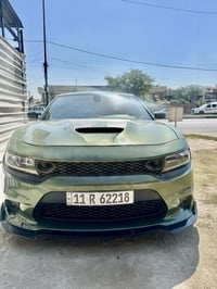 جارجر RT  اصل2023 مكينة 5700 ماشية 30 ميل السعر 23.500 وبيها مجال رقم ...