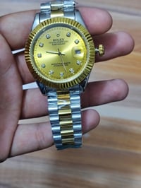 روليكس اوتماتيك موديلين سناتر والثاني ديت جيست القطعة 40 القطعة 40 الق...