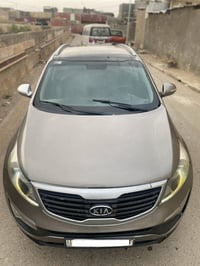 شباب  كيا سبورتج موديل 2014 ادوات متوؤمه وجاهزه وبيها حصه كاز  فول موا...