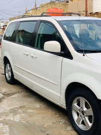 سيارة دوج كرفان موديل 2012  رقم  بغداد  سيارة خير من الله  يعني تبريد ...