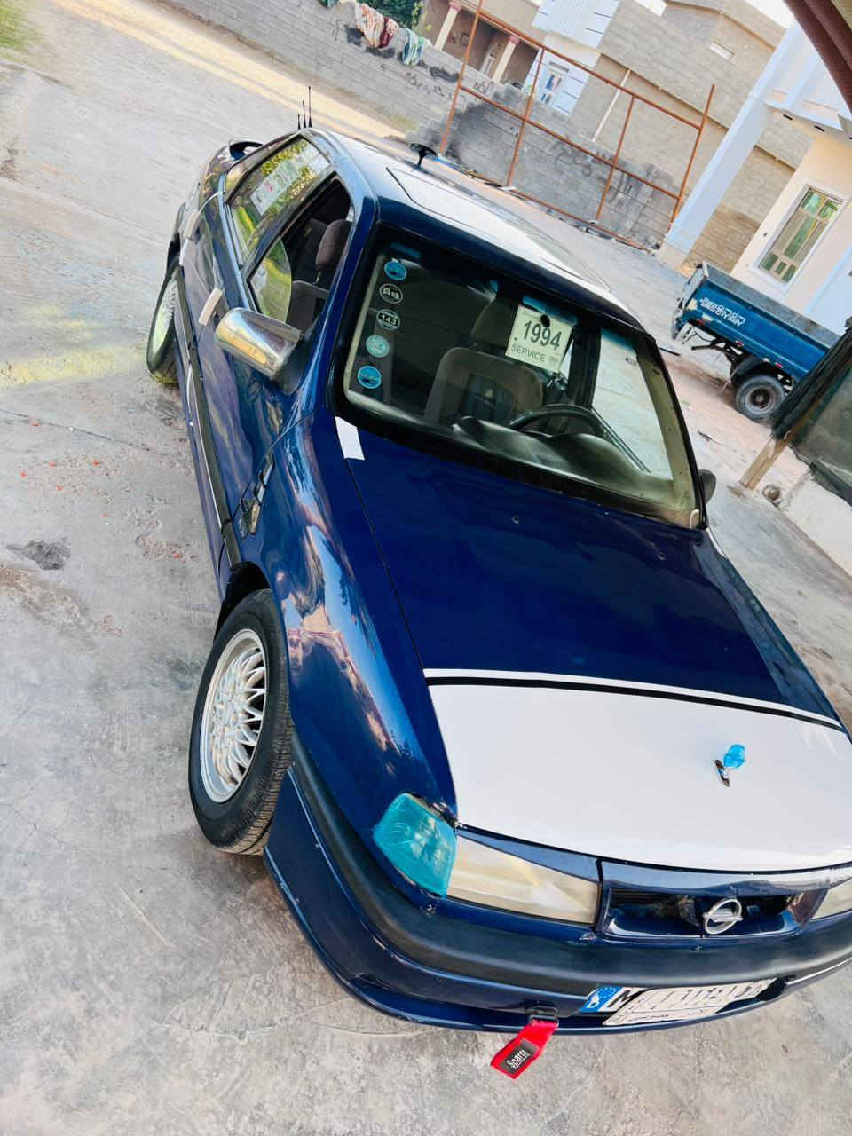 يالله اوبل فكترا للبيع موديل 1994 محرك 1800 المرغوب صبغ عام جماليه فقط كفاله من الخويس سنويه مجدده محرك كير صدر كهربائيات كلها شغاله تخم تاير جديد سياره مال جناي متعوب عليها جاهزه من كلشي السعر ٣٥ وبيه مجال  مكاني رمادي  #للاستفسار***********
