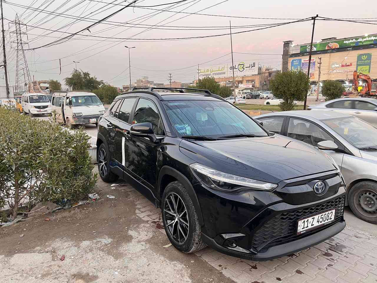 تويوتا كورلا كروس SE  هايبرد 
وارد امريكي  تبديل جاملغ فقط وصبغ
 الباب الصدر فتحيه بل شحن وصار بيها شخط  
فاتحين غراض البچم ورجعت شديتها نفسها
رقم بغداد بإسمي موديل 2024   جديده
لون اسود بيتنجاني 
ماشيه 18500 كيلو   
كامله مابيها اي نقص بحالة الوكاله
جميع الايرباگات سليمه
المواصفات:
تشغيل عن بعد 
- بصمه
- لايتات LED
- مثبت سرعه تفاعلي Adaptive Cruise Control 
- رادار امامي مانع تصادم
- رادار تحديد مسار
- تحكم ستيرن كامل
- ويل كب 18 سموك 
- ٣ انظمة قياده
- اوتو هولد
- هاند بريك بصمه
- شاشة كبيره نظام ابل كار بلي
- كاميرا خلفيه
- فور ويل (دفع رباعي)
- مكان السياره بغداد / الغزاليه 
رقم صاحب سيارة ***********
