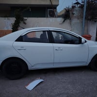 كيا سيراتو 2012خليجي حادثها جاملغ الأيسر الخلفي وشبر من الجنطه وحداديه...