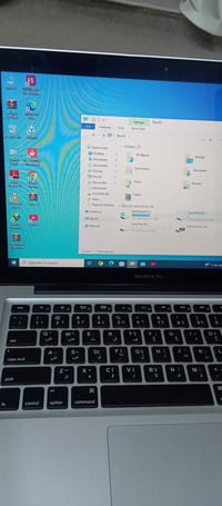 ماك بوك برو • شاشة ١٤ • i5 رام ٤GB