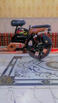 دراجه شحن • حجم ١٦ • ٤ بطاريات جدد