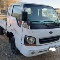 كيا أم عيون • محرك 3000 موديل 2002 • الرمادي الجزيرة