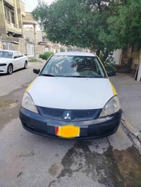 لانسر • ٢٠١١ • اوتوماتيك