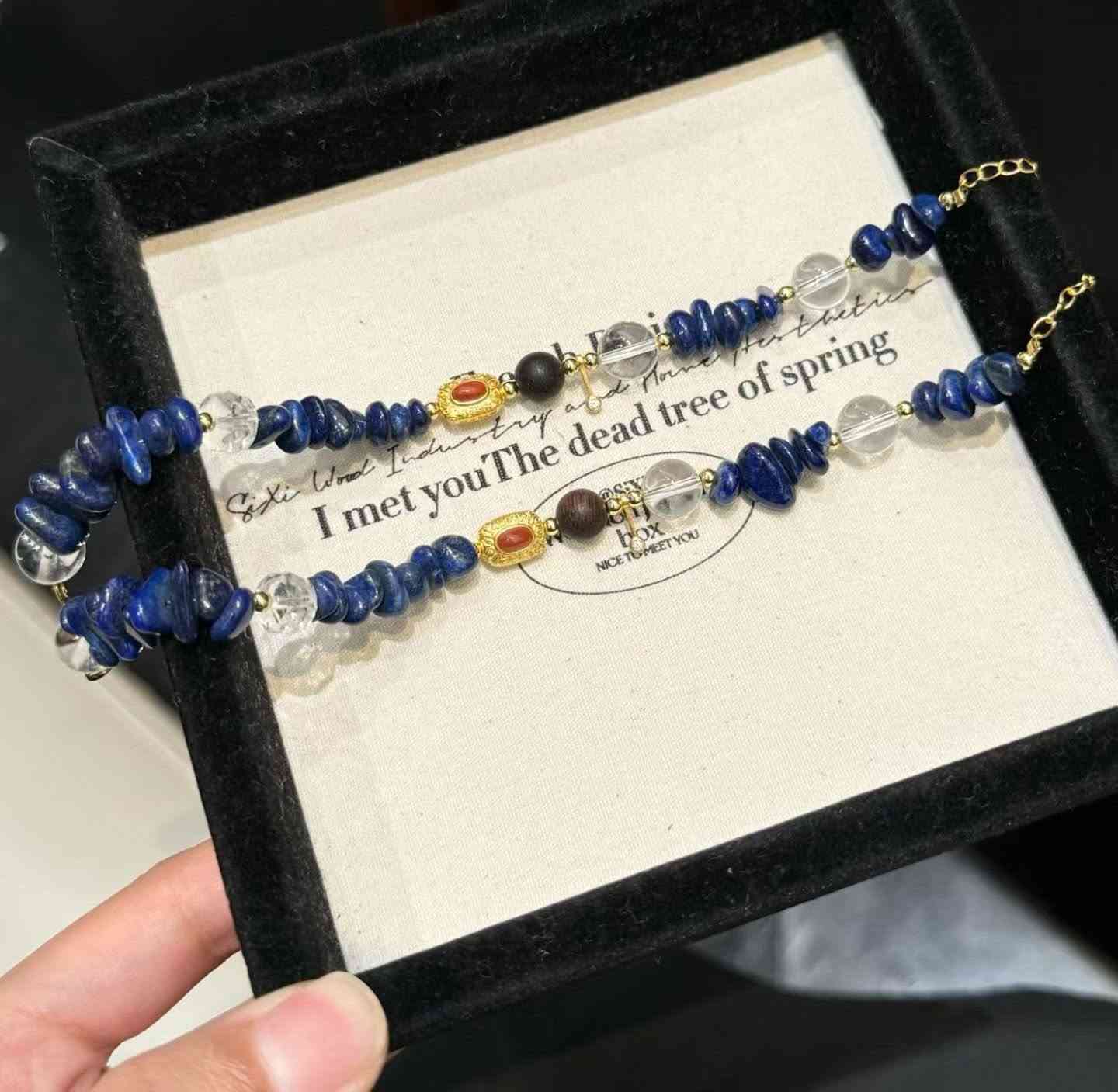 Southern Dream

Amidst the hustle and bustle of daily life, you need a boost of energy drawn from the very depths of the earth. This bracelet—crafted from Lapis Lazuli, Clear Quartz, and Black Kyara Agarwood—seamlessly blends the spiritual essence of these three elements:

🔹 **Lapis Lazuli** — As deep and profound as the night sky, it awakens your inner wisdom and intuition, empowering you to express yourself with clarity and make confident decisions in both your professional and creative endeavors.
🔹 **Clear Quartz** — A messenger of light, it purifies your energy field and amplifies the frequencies of other crystals, restoring clarity to your thoughts and attracting positive vibrations.
🔹 **Black Kyara Agarwood** — The spiritual essence of rare woods; its subtle, grounding fragrance calms the mind and dispels negative energy, endowing you with deep inner stability and protection.

Woven together into a single strand, these three elements offer more than just aesthetic beauty for your wrist—they serve as a portable "sanctuary of serenity" that accompanies you wherever you go.

📿 每一顆均經天然篩選，手工穿製。讓手腕上的小宇宙，陪你從容應對世事起伏。

If you would like this subtle beauty to become your daily companion, write to me 
📩WhatsApp：8613308361107

Don't wait, because a bracelet like this will probably never appear again


**إذا كنت صاحب هذا الإعلان وتريد حذفه لأي سبب، رجاءا أرسل رسالة إلى الدعم الفني**