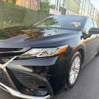 كامري موديل 2021 رقم بغداد باسمي السيارة نضيفة محرك كير كهربائيات تبري...