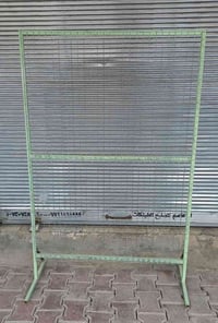 عارضة احذيه • رف حديد