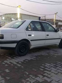 بسم الله  بيجو ٤٠٥ ٢٠١٢ مكفولة من الصبغ والضربة بيها جراد قليل السعر ٣...