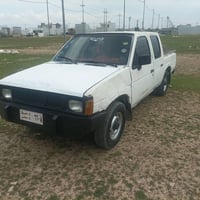 نيسان بيكاب • موديل ١٩٩٠ • مكينة ٢٠٠٢