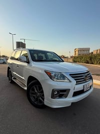 لكزز 2013  السياره باسمي تحويل مباشر رقم بغداد الجديد وسنويه جديده  LX...